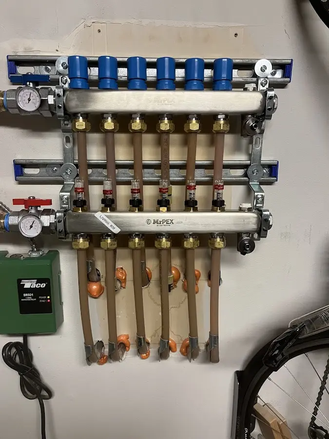 Plumber performing Water Heater Repair at a residential property in Baytown